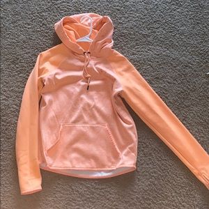 Bright orange Under Armour hoodie